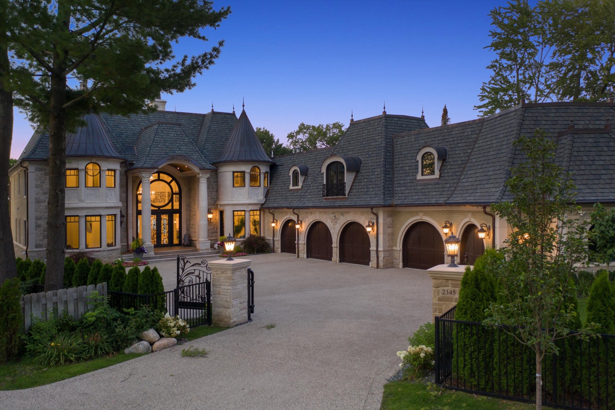The Lakecrest custom home exterior at dusk